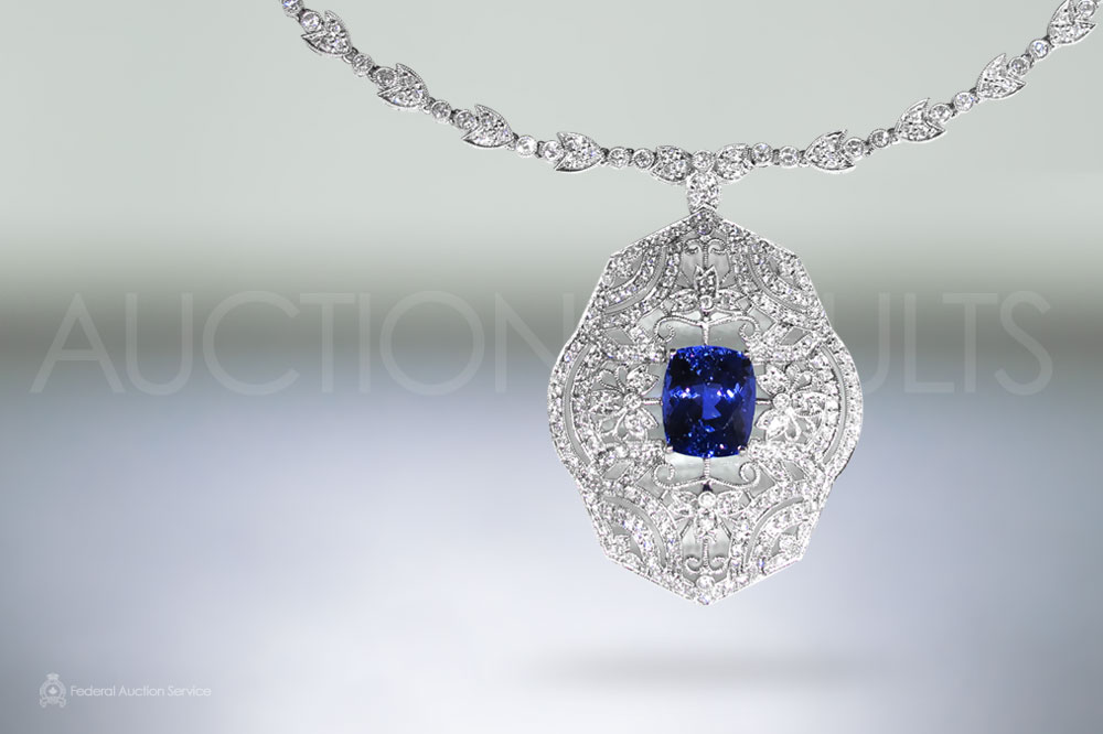 Elegant 18k White Gold Tanzanite and Diamond Pendant Necklace sold for $10,000