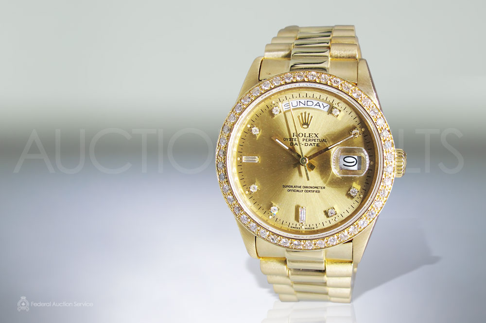 Men's 18k Yellow Gold Rolex Day-Date Automatic Wristwatch sold for $16,000