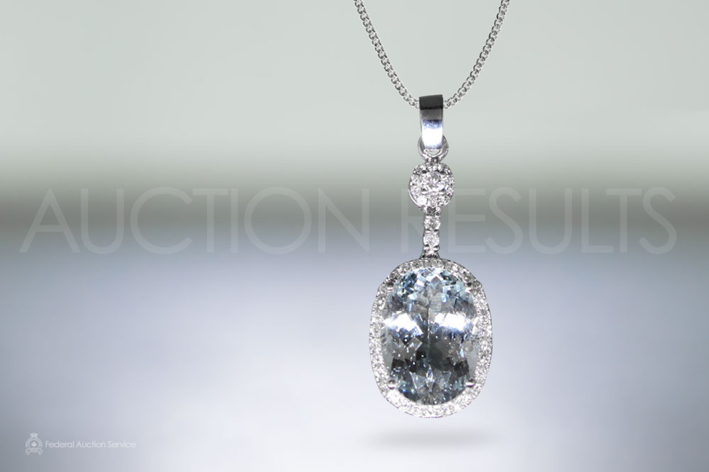 Lady's 14k White Gold Aquamarine and Diamond Pendant sold for $1,700