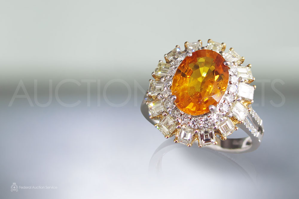 Lady's 3.16ct Orange Sapphire and Diamond Ring sold for $6,000