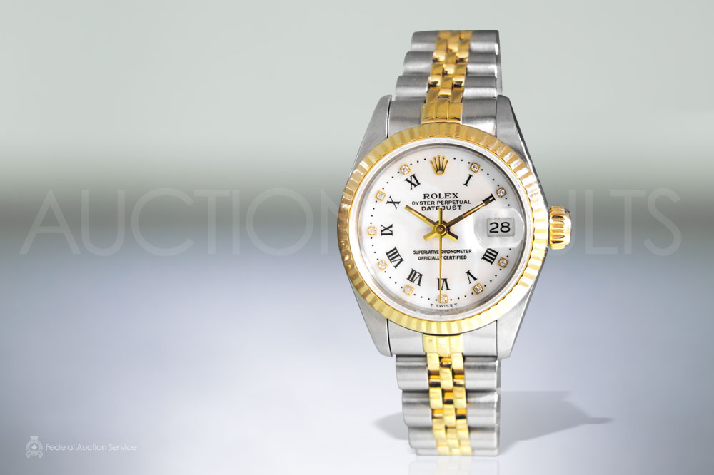 Lady's Stainless Steel/18k Yellow Gold Rolex Datejust Automatic Wristwatch sold for $6,000