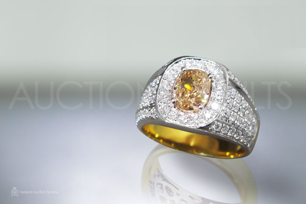 1.63ct Fancy Orange Diamond Ring sold for $8,500