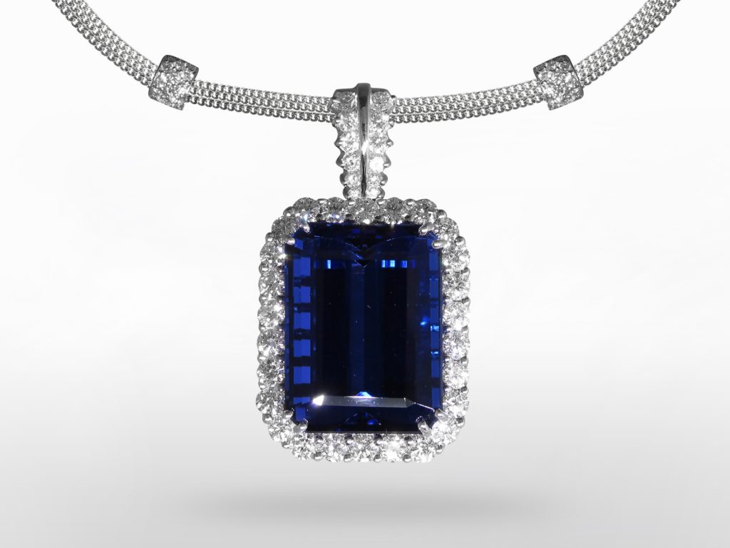43.25ct Emerald Cut Tanzanite and Diamond Pendant Necklace, signed "Takat"