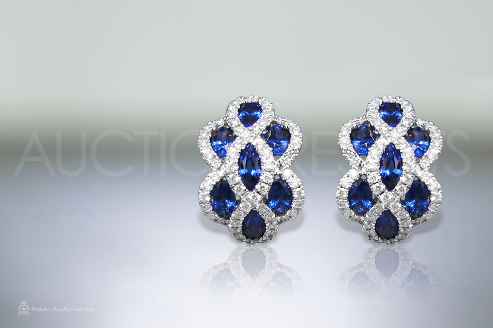 Lady's 18k White Gold Blue Sapphire and Diamond Earrings sold for $4,500