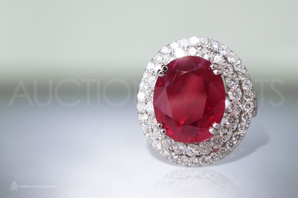 CGL Certified 7.59ct Oval Faceted Ruby and Diamond Ring sold for $10,000