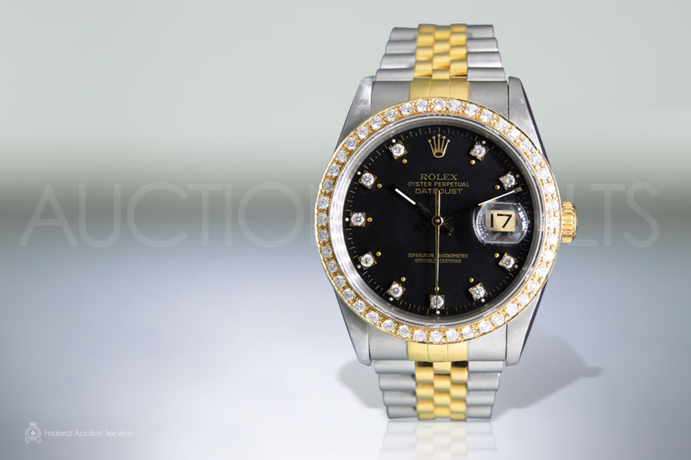Men's Stainless Steel/18k Yellow Gold Rolex Datejust Automatic Wristwatch with Diamonds sold for $8,000