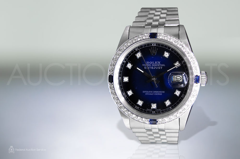 Men's Stainless Steel Rolex Datejust Automatic Wristwatch with Diamonds and Blue Sapphires sold for $9,000