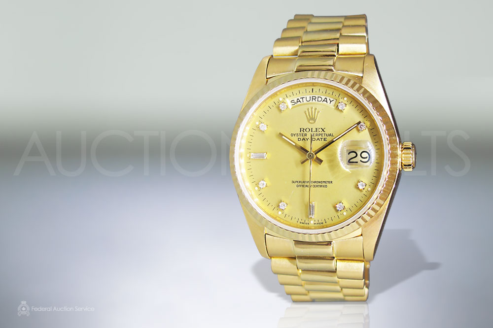 Men's 18k Yellow Gold Rolex Day-Date Automatic Wristwatch sold for $19,000