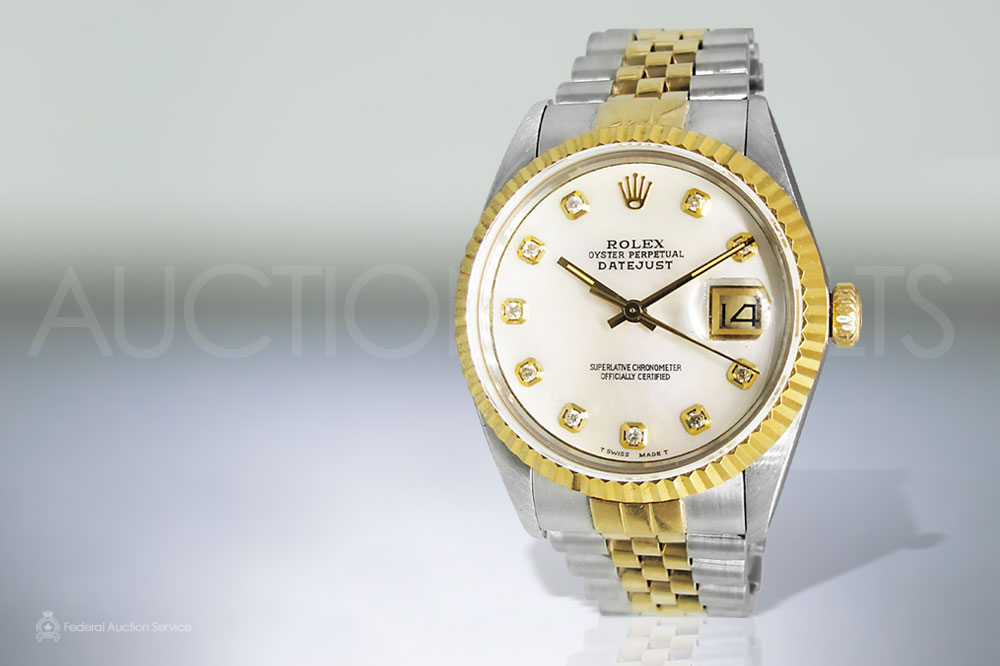 Men's 18k Stainless Steel and Yellow Gold Two Tone Rolex Datejust Automatic Wristwatch Sold For $6,200