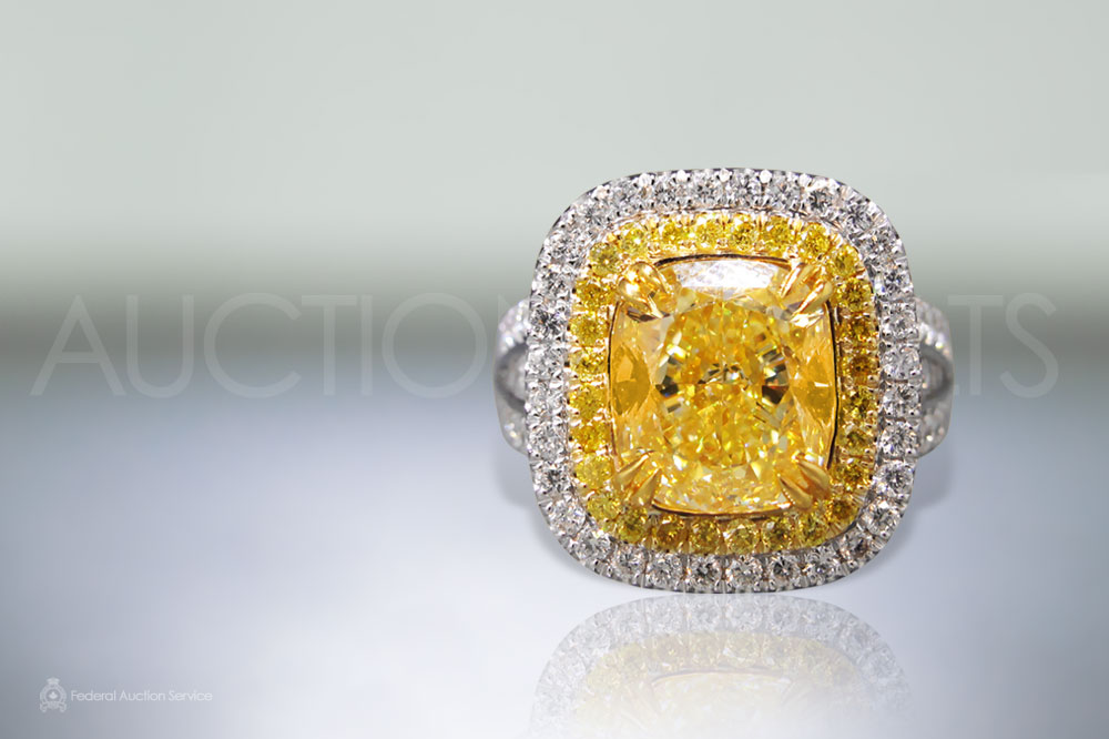 GIA Certified 5.07ct Fancy Yellow Diamond Ring sold for $101,000