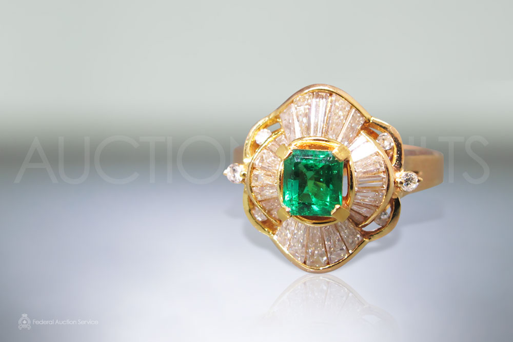 Lady's 18k Yellow Gold Emerald and Diamond Ring sold for $2,500